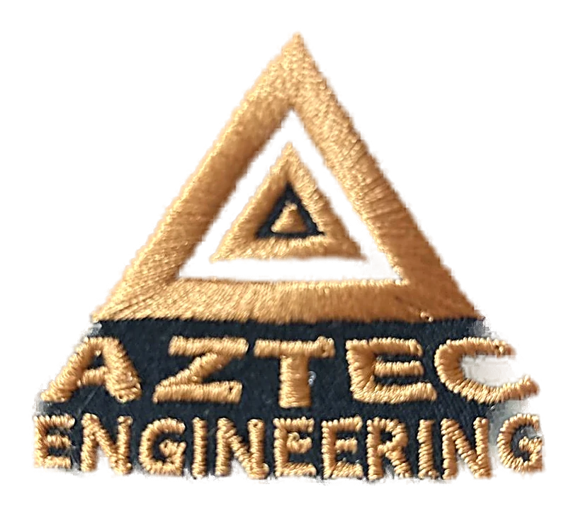 Gold embroidered Aztec Engineering logo on a black trucker cap